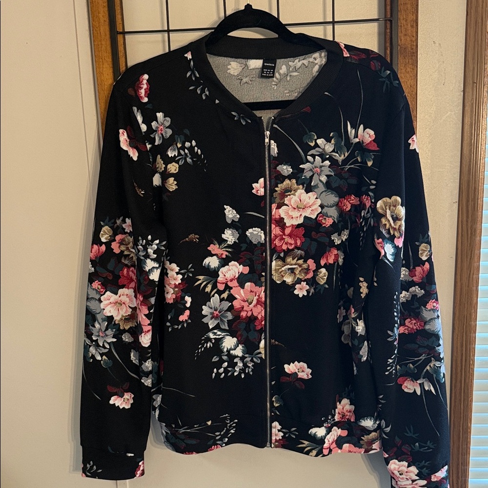 Amazon floral black bomber jacket. Very lightweight. Size XL